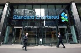 standard poors upgrades standard chartered bank to aa