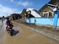 Philippine storm toll passes 1,000 as cities prepare burials