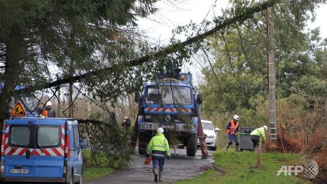 storms batter britain france disrupting travel power