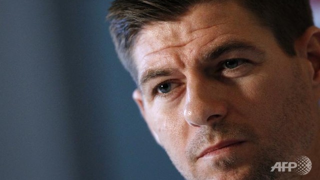 gerrard cools liverpool title talk