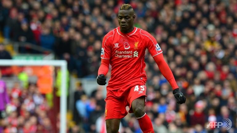 balotelli charged over racist post