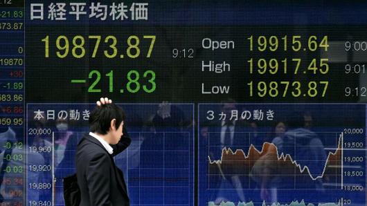 Asian markets tumble on sell-off in tech, energy firms
