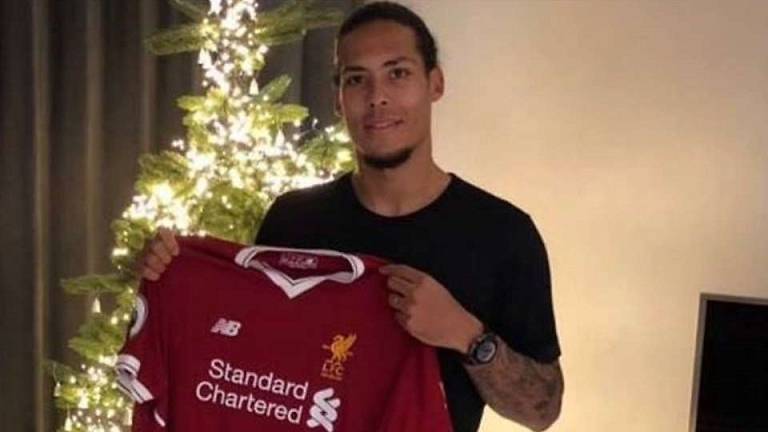 liverpool land van dijk in world record deal for defender