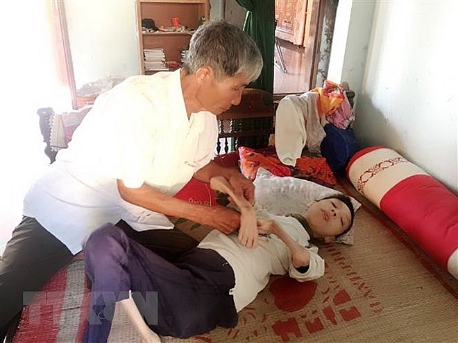 vietnam japan boost coordination in helping aodioxin victims