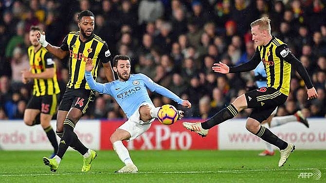 man city withstand late watford onslaught to move five points clear