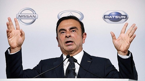 ex nissan chief ghosn charged served with fresh arrest warrant