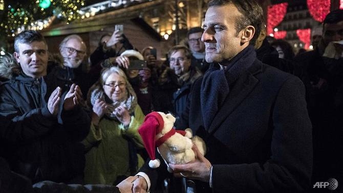 macron visits strasbourg as police probe potential accomplices