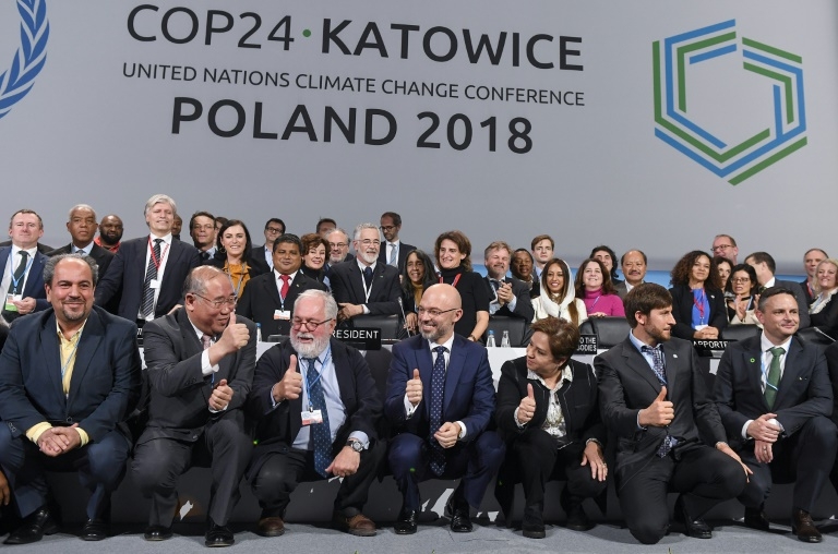 nations agree milestone rulebook for paris climate treaty