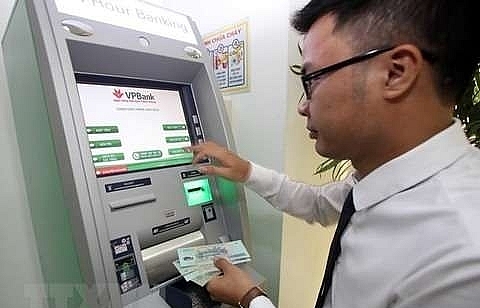 Central bank takes steps to ensure ATM service quality before Tet