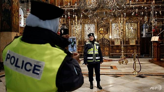 pilgrims gather in bethlehem to celebrate christmas eve