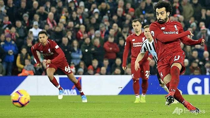 liverpool open up six point lead as man city lose again at leicester