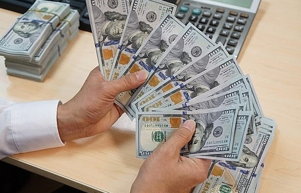 Reference exchange rate down 1 VND on December 26