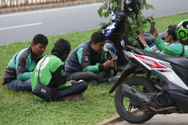 indonesia keeps close watch on gojek grab merger for fear of monopoly