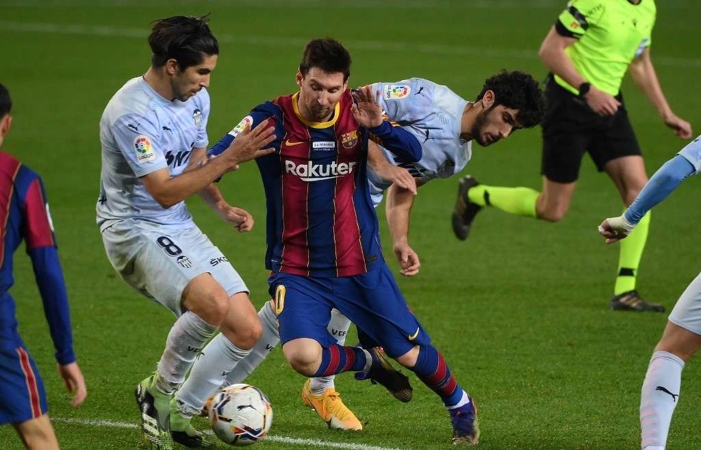 Messi equals Pele goal record but Barca lose more ground