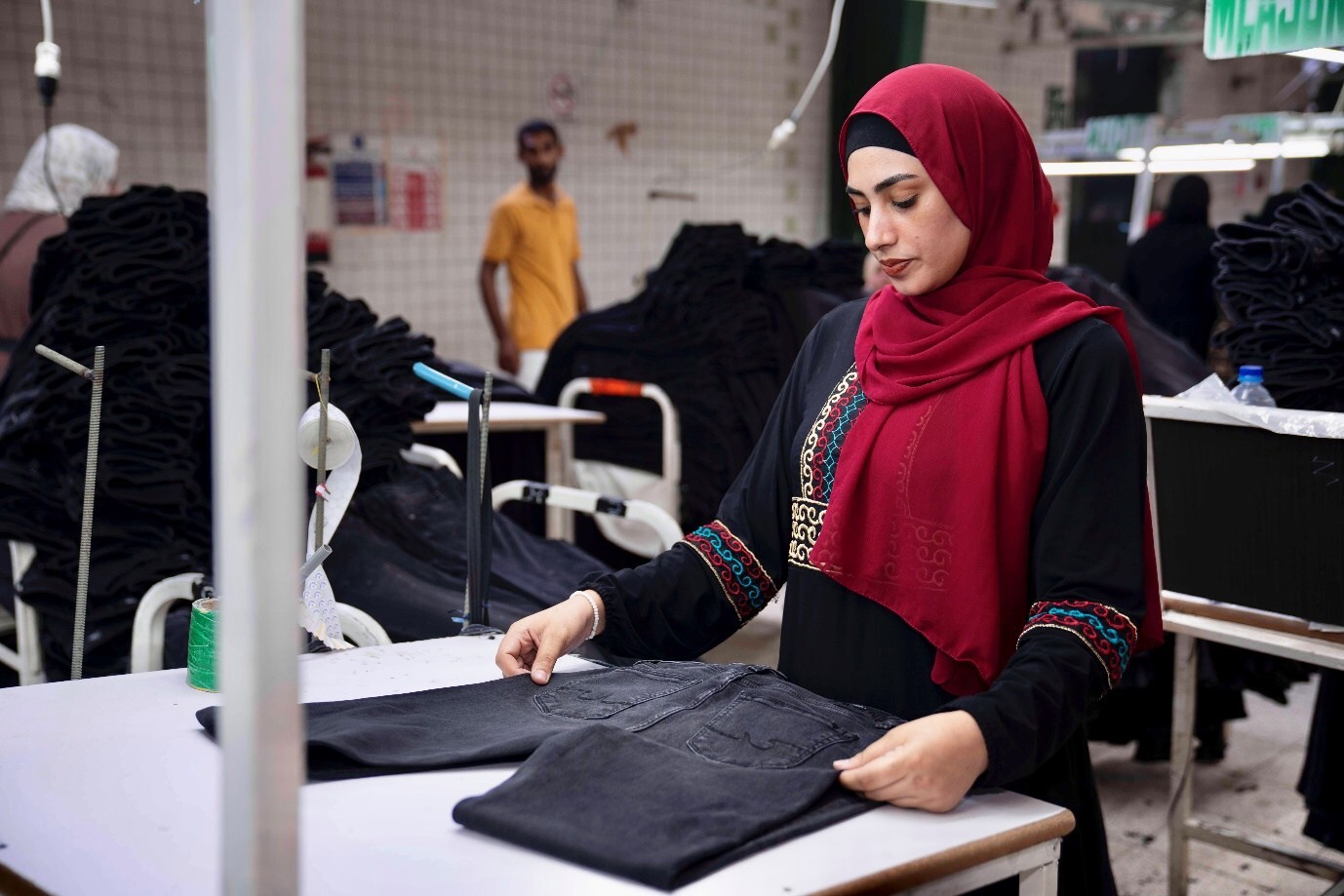 Fatma, a participant of the RISE Program, working at a factory in Egypt. (Source: RISE)