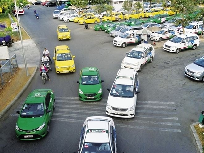 Putting ride-hailing and taxi firms under same hat could blunt growth