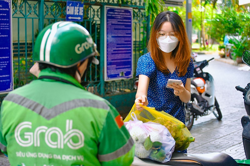 Vietnam's pandemic restrictions greatly widen Grab's losses